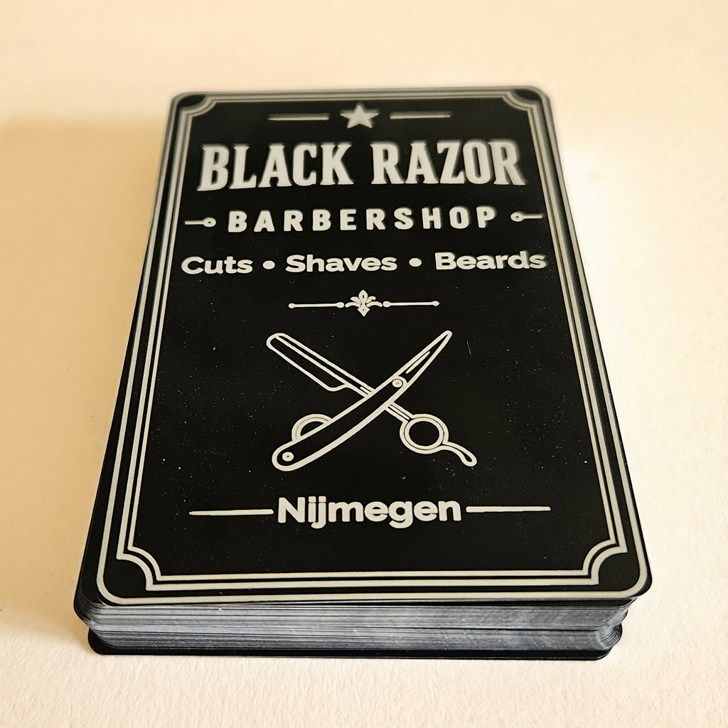 Luxe aluminium visitekaartje met lasergravure voor een barbershop