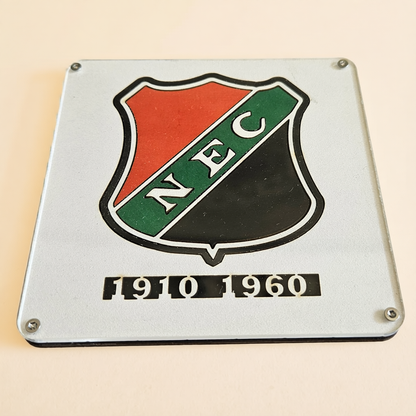 NEC onderzetter met historisch logo uit de periode 1910 tot 1960